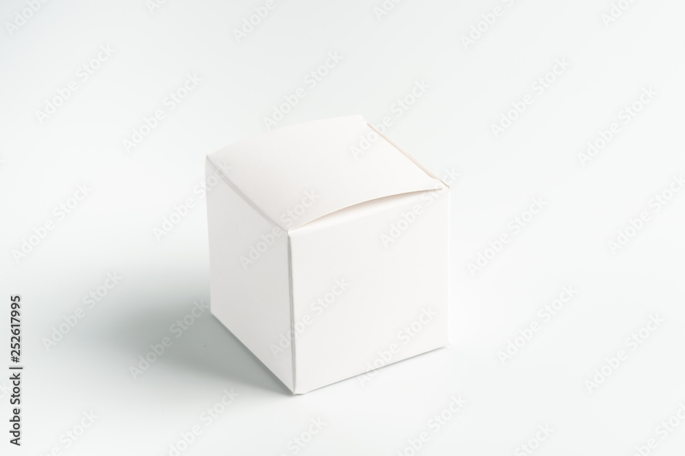 white square cardboard box on a white background, moke up white square cardboard box on a white background, moke up