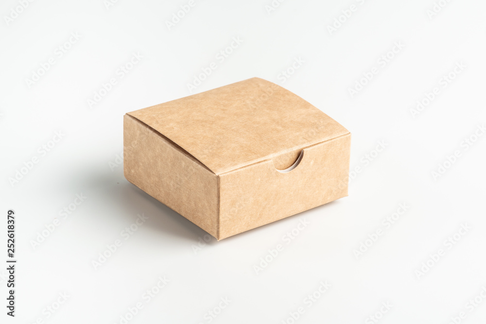 Kraft cardboard box on a white background, moke up Kraft cardboard box on a white background, moke up