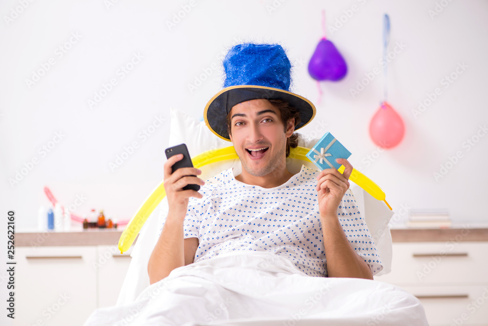 Young man celebrating his birthday in hospital Young man celebrating his birthday in hospital