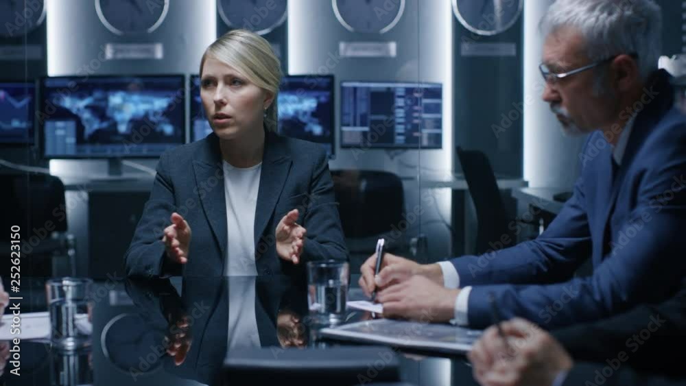 Female CEO of the Company Holds Briefing with Executives and Top Managers, Having Discussion in the Conference Room. Businesspeople Strategizing and Talking at the Business Meeting Female CEO of the Company Holds Briefing with Executives and Top Managers, Having Discussion in the Conference Room. Businesspeople Strategizing and Talking at the Business Meeting