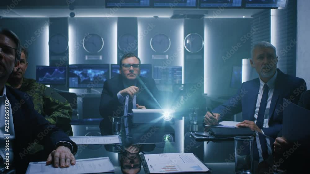 custom made wallpaper toronto digitalAt the Weekly Briefing Meeting CEO and Company Owner Watches Revenue Growth and Company Finances Strategy Information Shown with Laser Projector, He Makes Comments. Businesspeople in Conference Room 