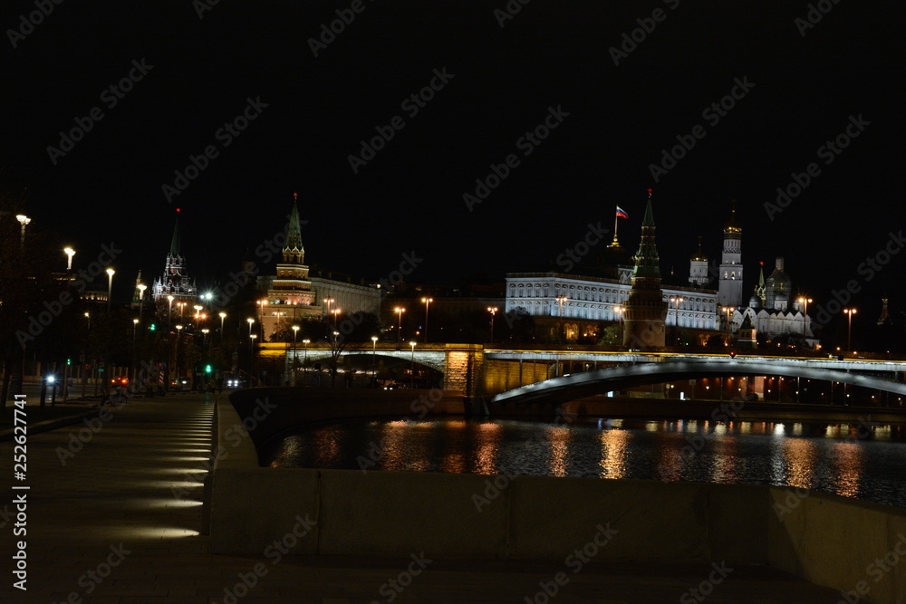 Fototapeta premium Moscow, Kremlin, Russia, night city, buildings, moon, moonlight, cars, dogrog, light, water, sky, night, city, bridge, water, river, architecture, lights, reflection, light, skyline, travel, panorama,
