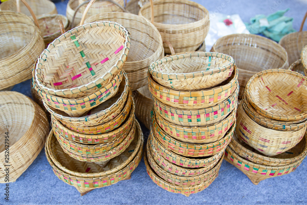 Foto Stock Community Products Weaving A Wicker Basket basketry, fruit basket  products By Handmade, in a market of Thailand | Adobe Stock