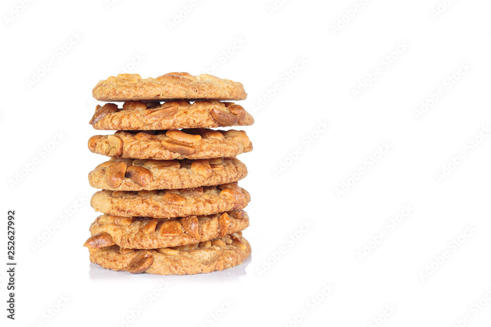 pile peanut cookies on white background. pile peanut cookies on white background.