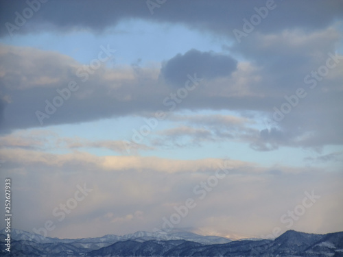 clouds over mountains © hoshi