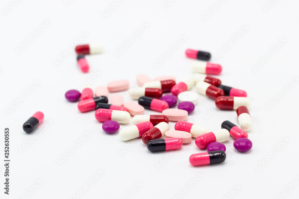 the pile of pills and capsules white background concept Health the pile of pills and capsules white background concept Health