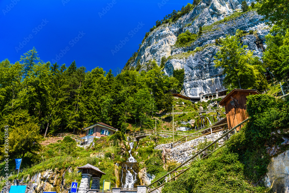 Houses on the cliff near Lake Thun, Thunersee, Bern, Switzerland
