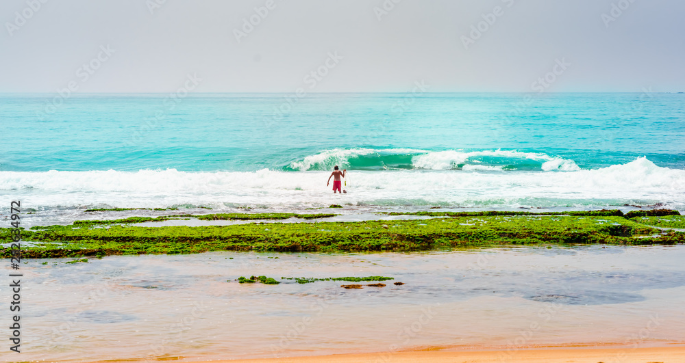 View on fisherman at the beach of Tangalle in Sri Lanka