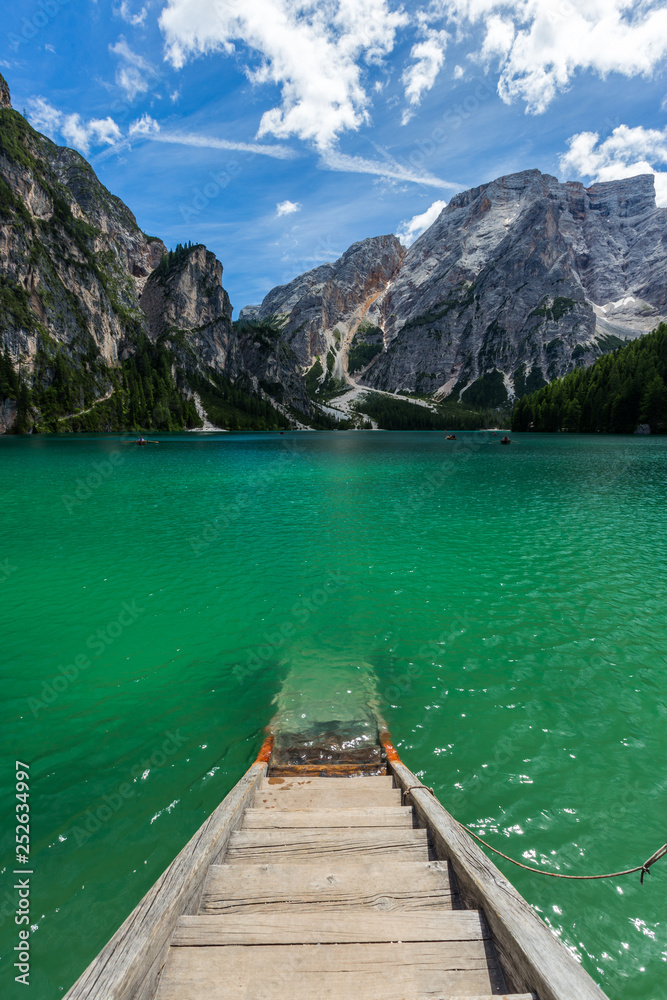 amazing view of turquoise Lago di Braies Lake or Pragser Wildsee in Dolomite mountains , Italy