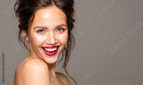 close-up face of young smiling girl with copy space
