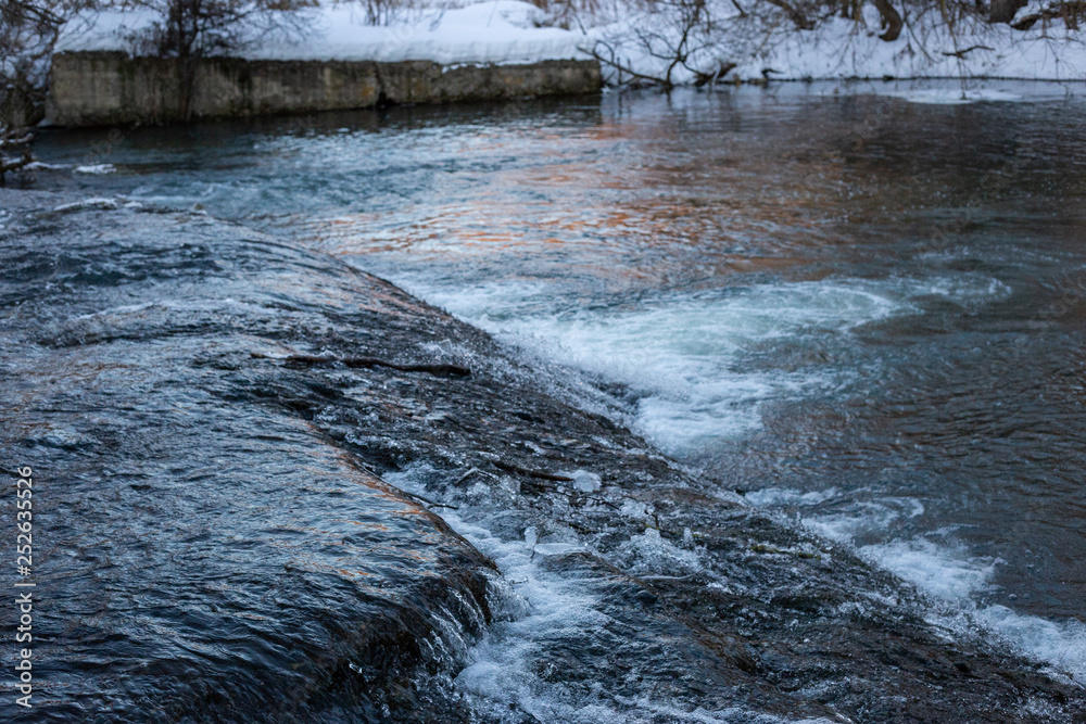 small waterfall on the river