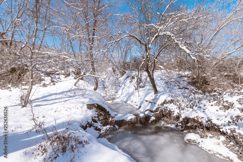 Frozen mountain river at winter season © Vastram