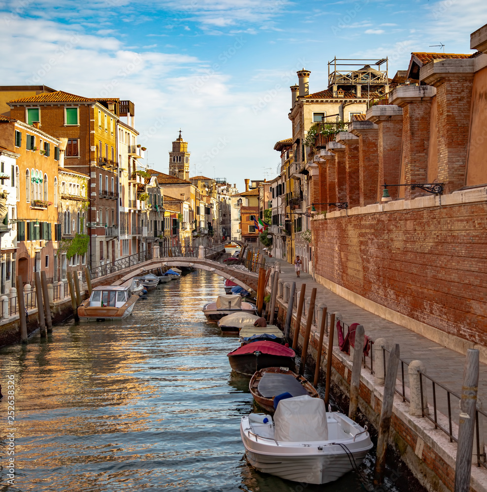 Italy beauty, boats on typical canal street in Venice, Venezia