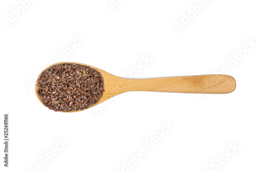 Flax seeds, linseed pile with wooden spoon isolated on white background.Organic food concept