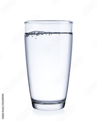 Water in glass isolated on white background.
