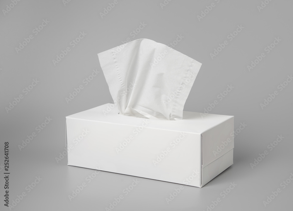Opened tissue box on grey background for print design and mock up Stock