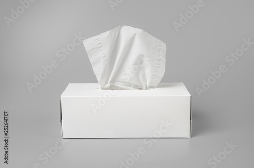 Opened tissue box on grey background for print design and mock up
