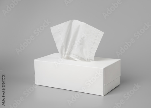 Bilde på lerret Opened tissue box on grey background for print design and mock up