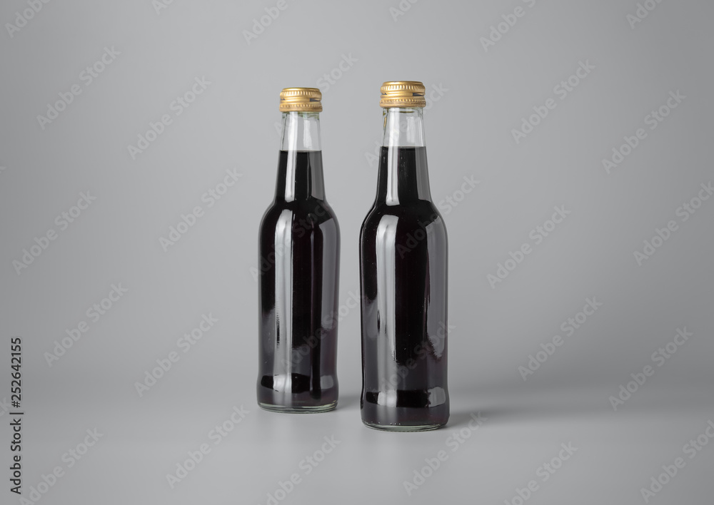 Mini wine bottle on grey background for print design and mock up Mini wine bottle on grey background for print design and mock up