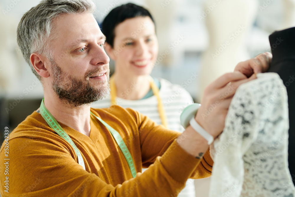 Obraz premium Fitting dress on dummy