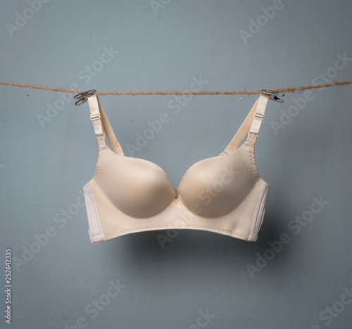 Women's bras hanging on rope