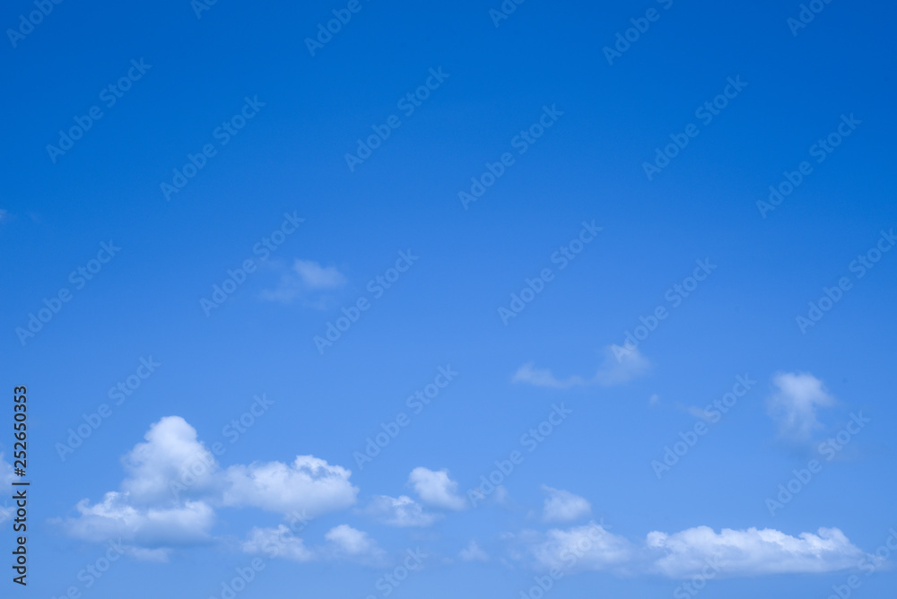 Fototapeta premium Blue sky background and white clouds with copy space, good for message and background.