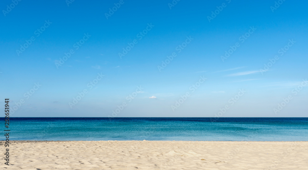 White sand with beautiful beach and tropical sea clear blue sky over sea
