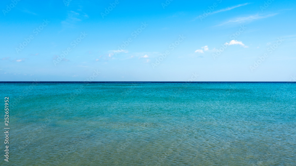 Beautiful tropical sea with clear blue sky background