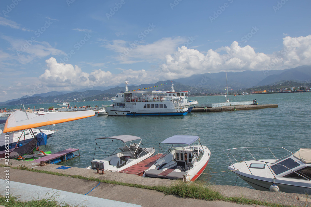 Moorage for boats. View Of Embankment Of The Georgian Resort Town Of Batumi