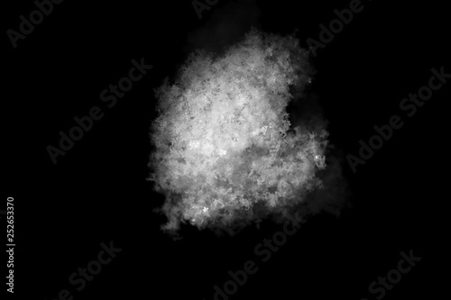 White snow ball made of fluffy snowflakes on a black background