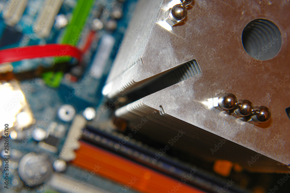 Powerful radiator on an electrical computer board as part of the cooling system Powerful radiator on an electrical computer board as part of the cooling system