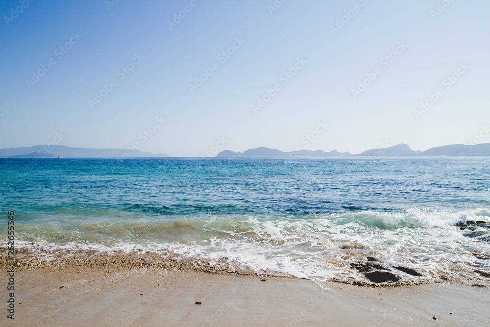 Blue sea in Melide beach, Pontevedra, Spain Blue sea in Melide beach, Pontevedra, Spain