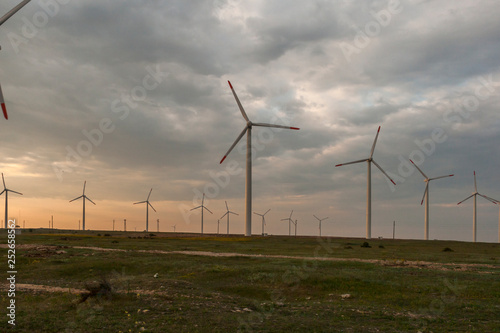 Sunset landscape with Wind turbines near Kaliakra Cape at Black Sea Coast, Dobrich Region, Bulgaria,