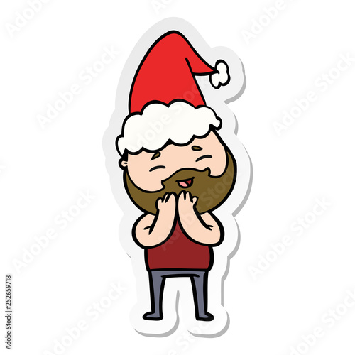 sticker cartoon of a happy bearded man wearing santa hat