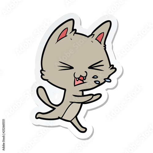 sticker of a cartoon cat hissing