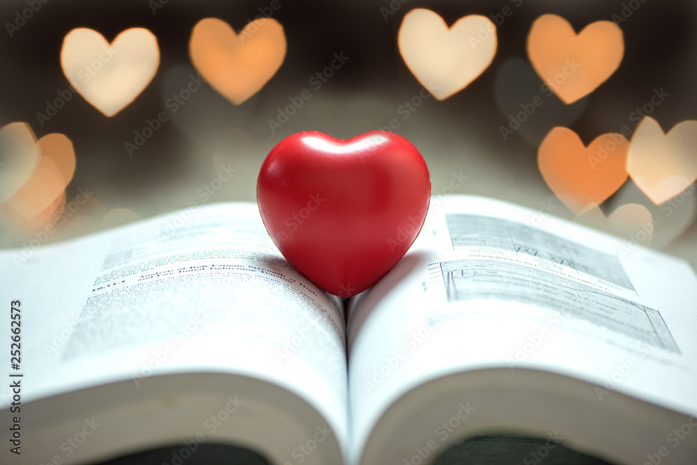 Ball Red heart on the book. Ball Red heart on the book.