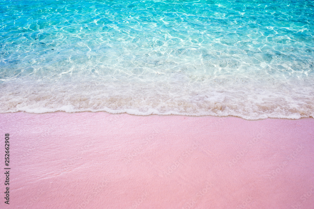 Soft blue ocean wave on pink sandy beach summer concept - obrazy, fototapety, plakaty 