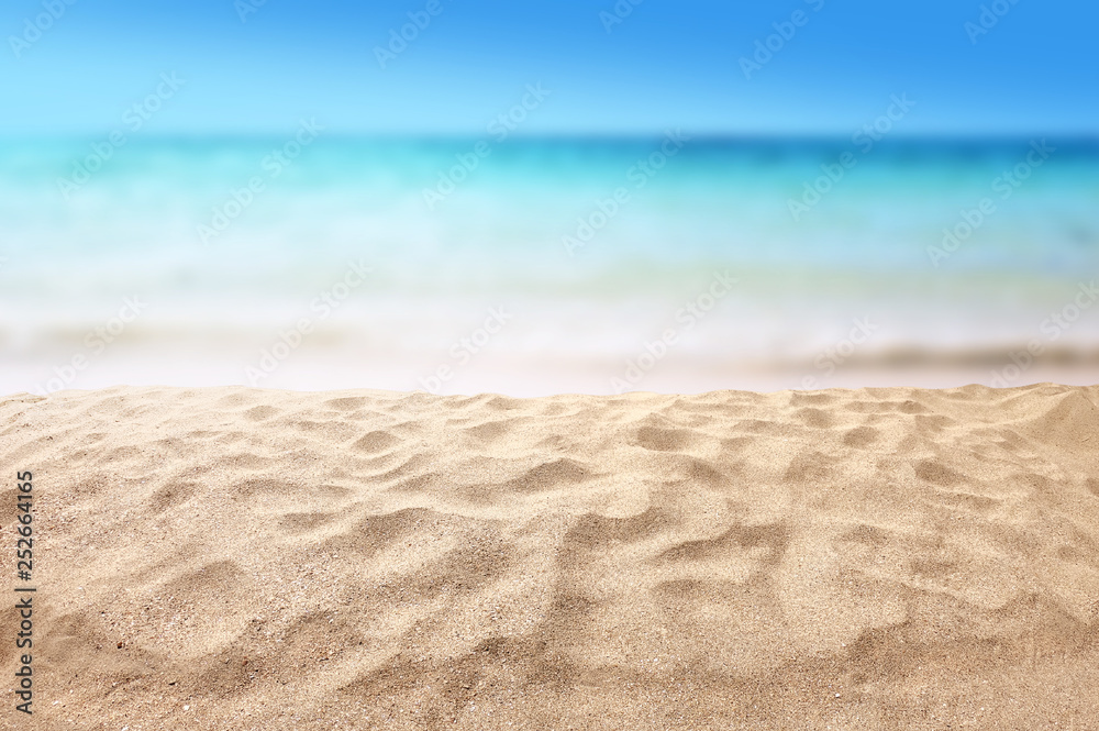 beautiful sandy beach with blur ocean background summer concept - obrazy, fototapety, plakaty 