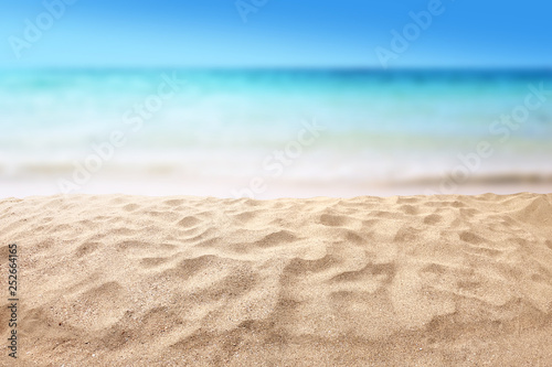 Tela beautiful sandy beach with blur ocean background summer concept