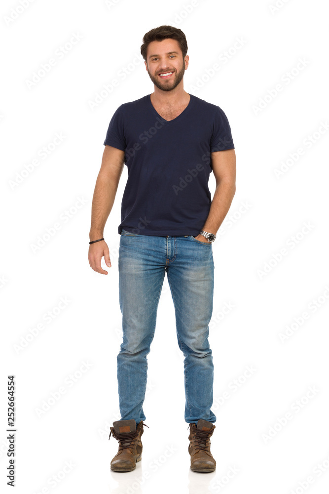 Smiling Handsome Man Is Standing With Hand In Pocket Smiling Handsome Man Is Standing With Hand In Pocket