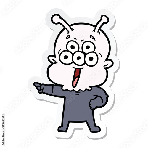 sticker of a happy cartoon alien pointing
