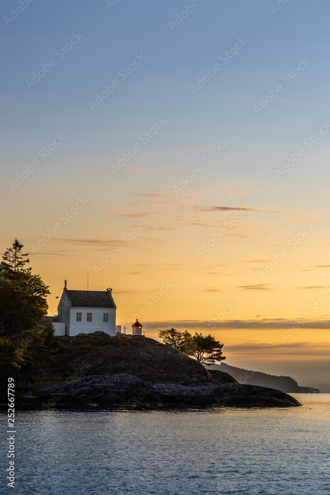 Small house in the Norway. Archipelago landscape 