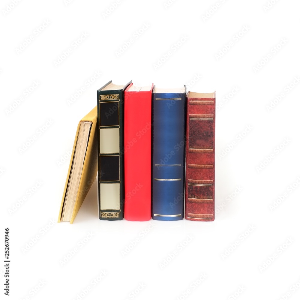 Naklejka premium Stacks of books isolated on white background