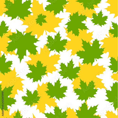 Abstract background from a variety of bright maple leaves on a white background. Seamless pattern.