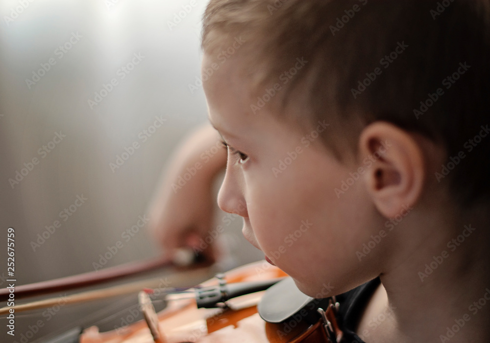 Handle hold violin. Little boy carrying violin. Young boy playing violin, talented violin player. Handle hold violin. Little boy carrying violin. Young boy playing violin, talented violin player.