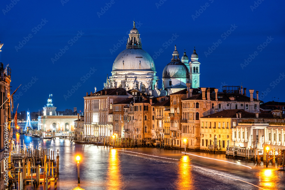 Night shot of Grand Canal and Basilica Santa Maria della Salute, Venice, Italy.
