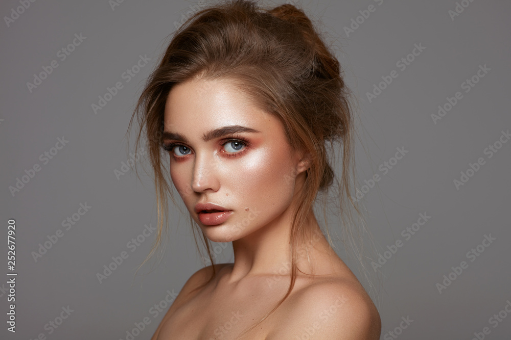 Portrait of young pretty girl with fasionable hairdo Portrait of young pretty girl with fasionable hairdo