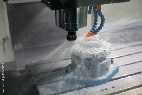 Photography milling on CNC center with metalworking fluid