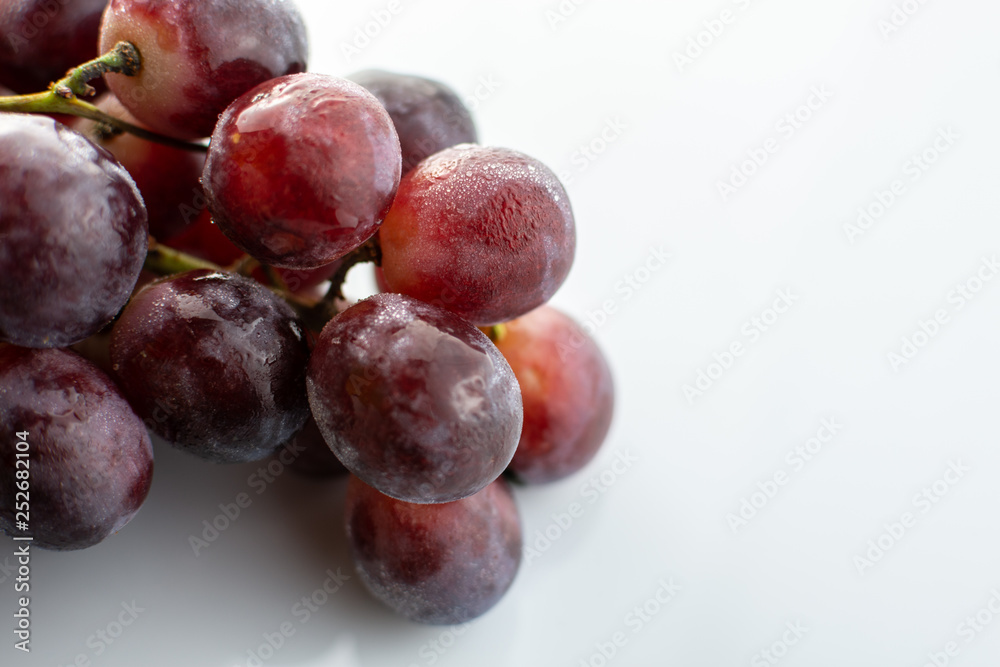 Bunch of red wet grapes