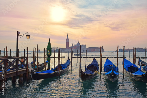 gondolas moored on the Grand Canal, evening in Venice